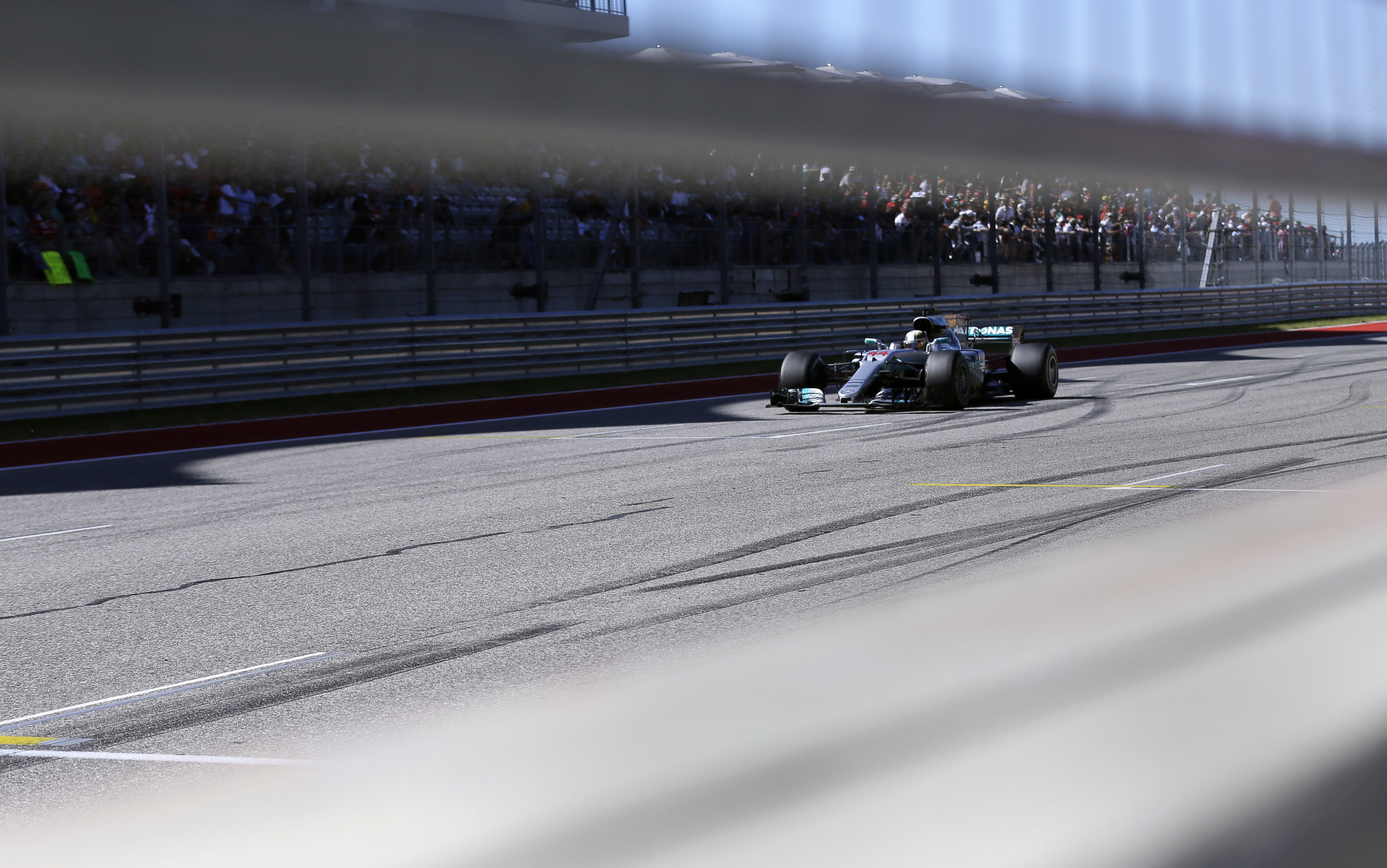 Mercedes driver Lewis Hamilton (44), of Britain, passes the grandstands during the Formula One U.S. Grand Prix auto race at the Circuit of the Americas- AP